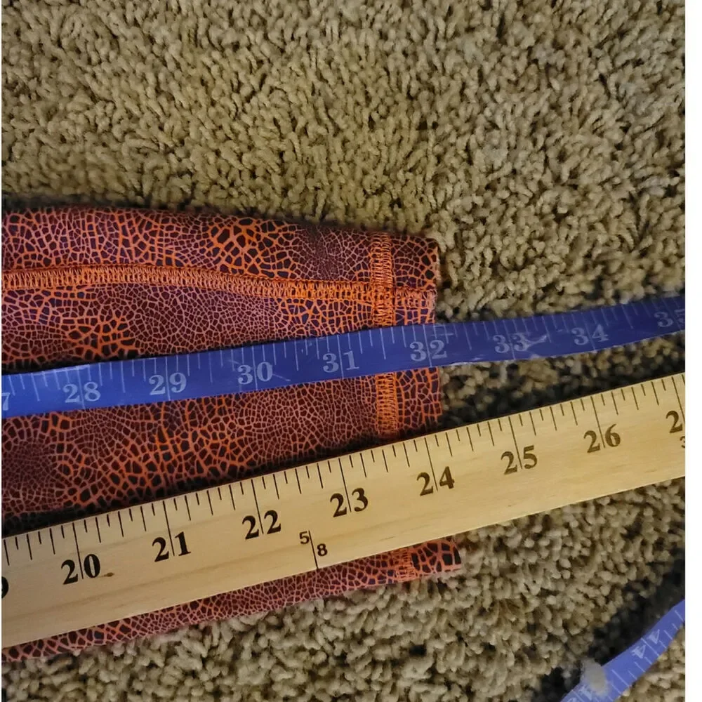 Lululemon Invigorate High-Rise Tight 25” in Crackle Orange, sz 6